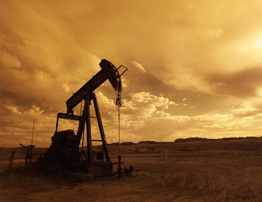 oil well at sunset